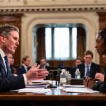 Keir Starmer and Kemi Badenoch clashing during a debate at Prime Minister's Questions.